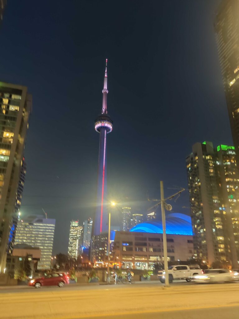 Team enjoying Toronto scenery night time during smart office installation