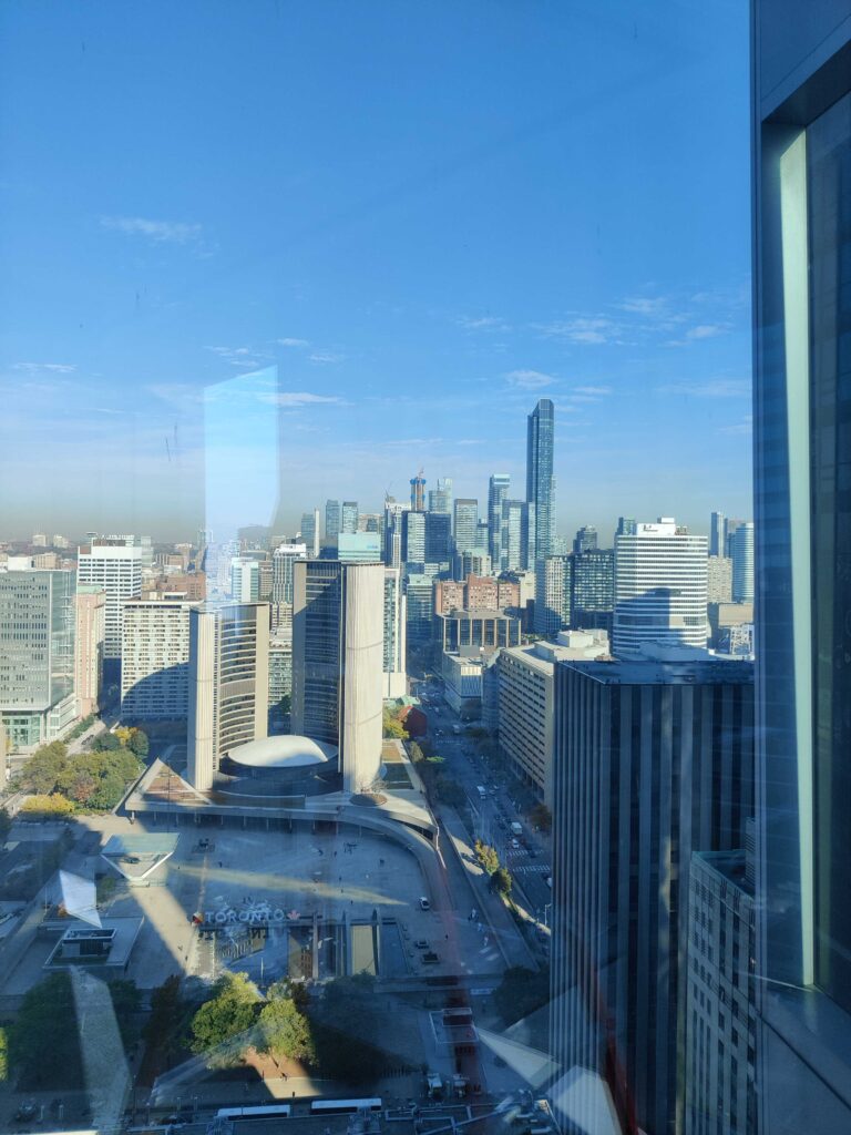 Team enjoying Toronto scenery daytime during smart office installation