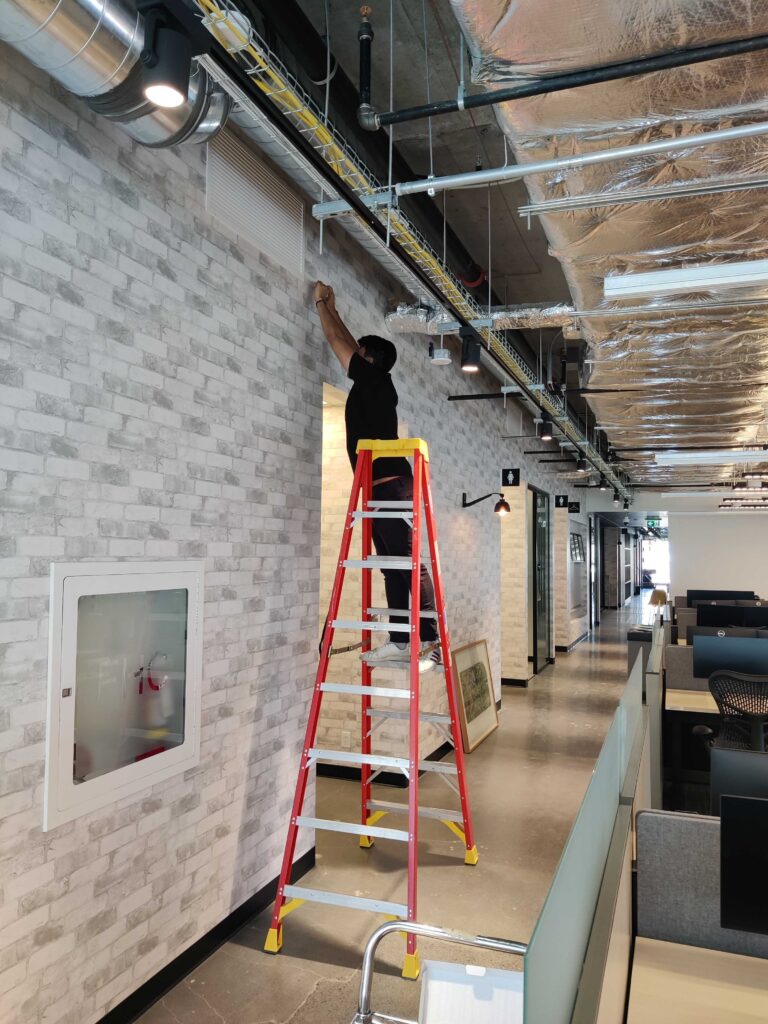 Team installing smart sensors in Toronto office